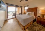 Guest suite bedroom 1 with Queen bed and ocean view
